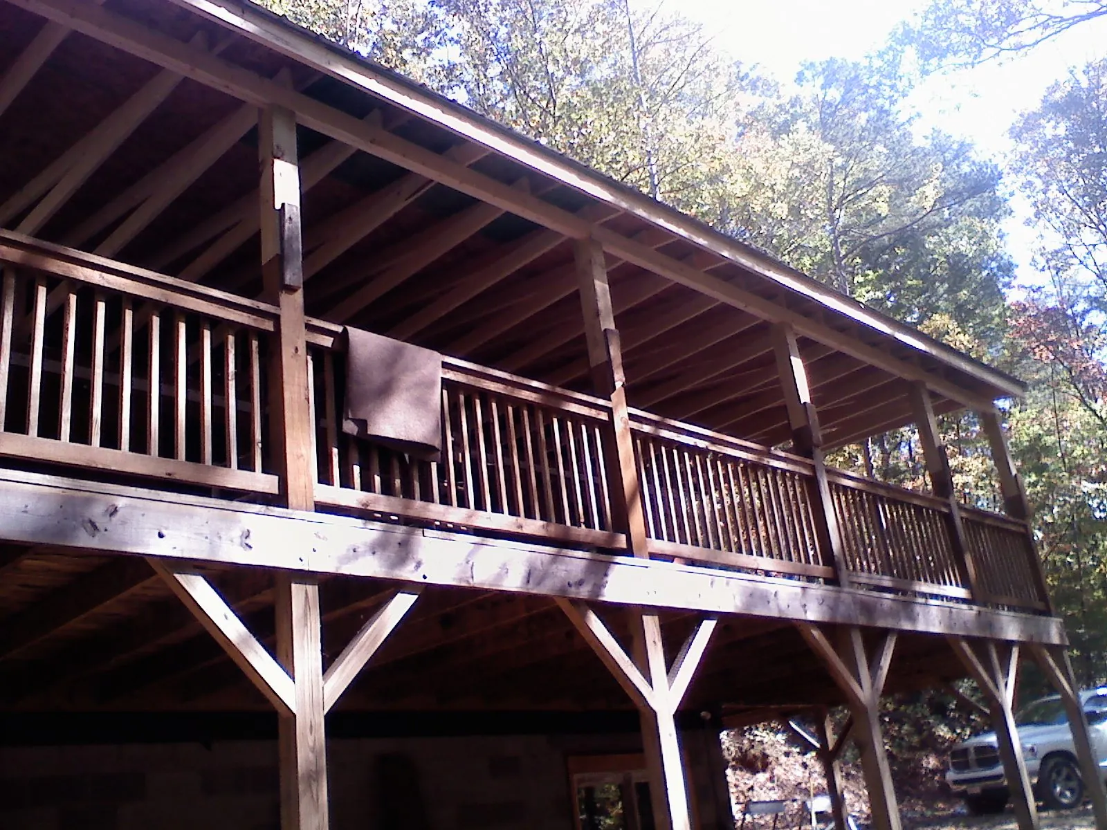 Timber framing under a new elevated porch and deck — Roof Leak Repair in Juda by Roofing Brothers